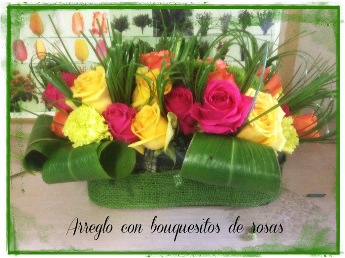 Arreglo de flores con bouquets de rosas